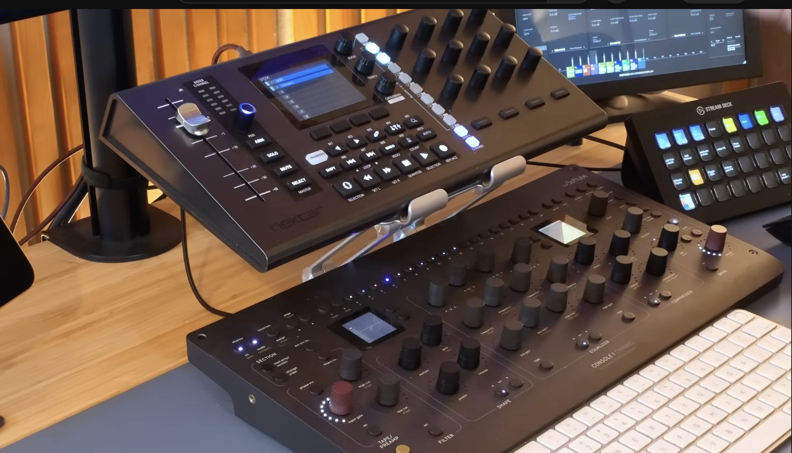 Nektar CS12 controller on a stand above the Softube Console 1 Channel on a mixing desk